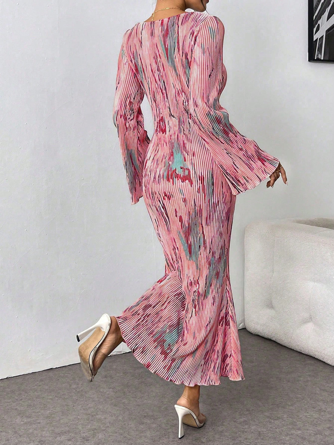 Add a touch of effortless elegance to any occasion with our Chic Pleated Acid Wash High-Low Hem Maxi Dress. Featuring a unique acid wash design and pleated details, this dress offers a playful and stylish look. Perfect for any event, this dress will be sure to make a statement!