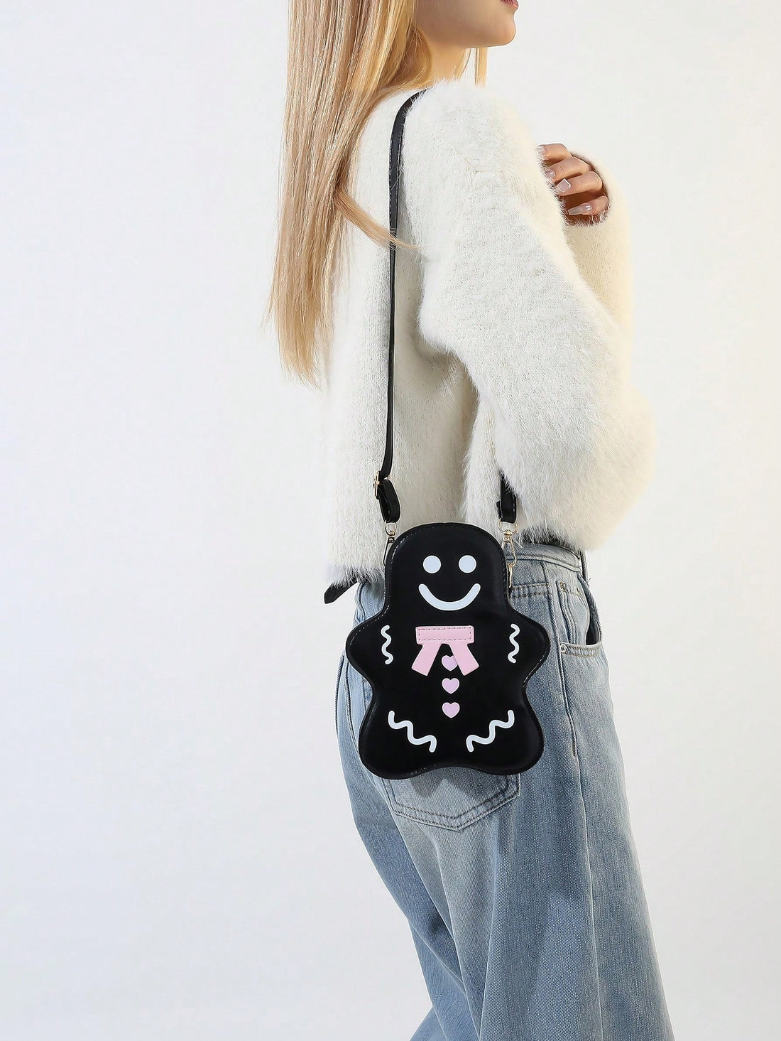 Add some whimsical charm to your style with our Whimsical Gingerbread Man PU Leather Shoulder Bag! Crafted with high-quality materials, this bag is not only perfect for Halloween, but also makes a unique and thoughtful gift. With its spacious design and durable construction, it's the perfect accessory for any occasion.