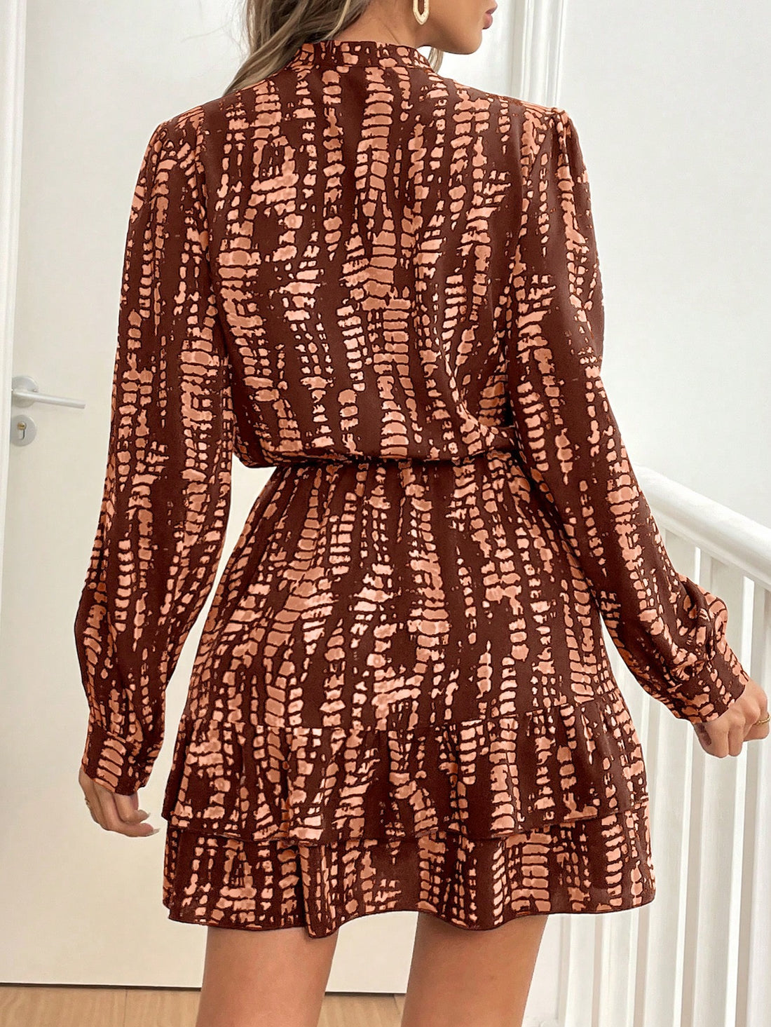Expertly crafted for the autumn season, this Chic Puff Sleeve Dress is sure to make a statement. With a stylish stand collar and elegant ruffle hem, it offers a fashionable twist on a classic design. The puff sleeves add a touch of volume and the lightweight fabric provides all-day comfort. Perfect for any occasion, this dress is a must-have for any fashion-forward wardrobe.