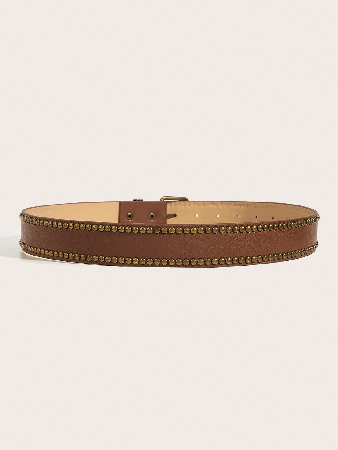 This Boho Chic Vintage Handmade Studded PU Leather Belt is the perfect accessory for adding a touch of bohemian flair to any outfit. Handmade with high-quality PU leather and adorned with stylish studs, this belt is both fashionable and functional. Elevate your style and add some vintage charm with this unique piece.
