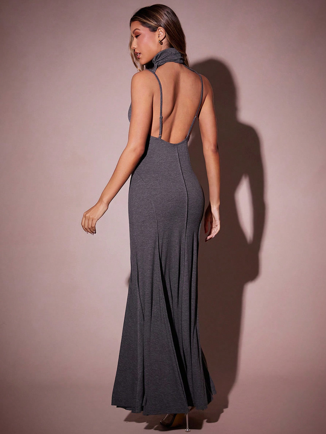 Turn heads this autumn in our Elegant Solid Color Backless Mermaid Dress. Featuring a chic stand collar and a flattering mermaid silhouette, it perfectly blends sophistication with a touch of daring thanks to its backless design. Cozy enough for cooler days yet effortlessly stylish, this dress is your new go-to for making any occasion feel special. Step out and let your confidence shine with every twirl!