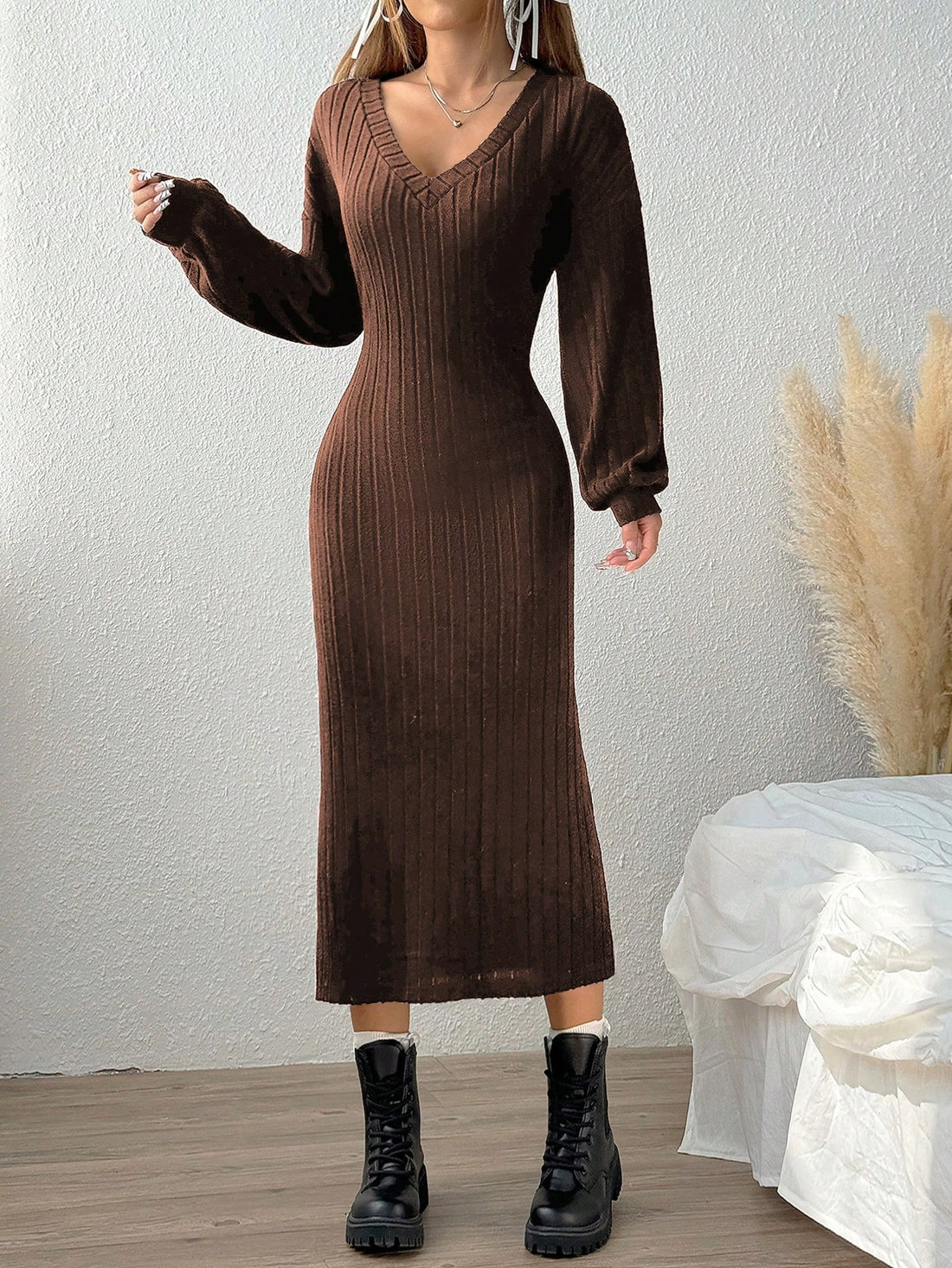 Cozy up in style with our Chic &amp; Cozy V-Neck Ribbed Sweater Dress! With a flattering v-neckline and long sleeves, this dress will keep you warm and fashionable. Perfect for any occasion, this dress is the definition of chic and cozy.
