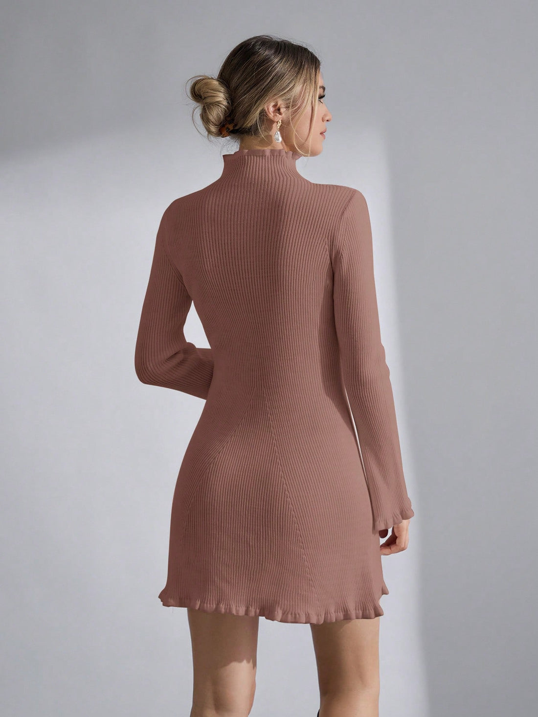 This knit dress is oh la la chic with its Frenchy style and delightful lettuce trim. The lilac color exudes elegance, making you stand out in any crowd. Say oui to effortless style with this unique piece!