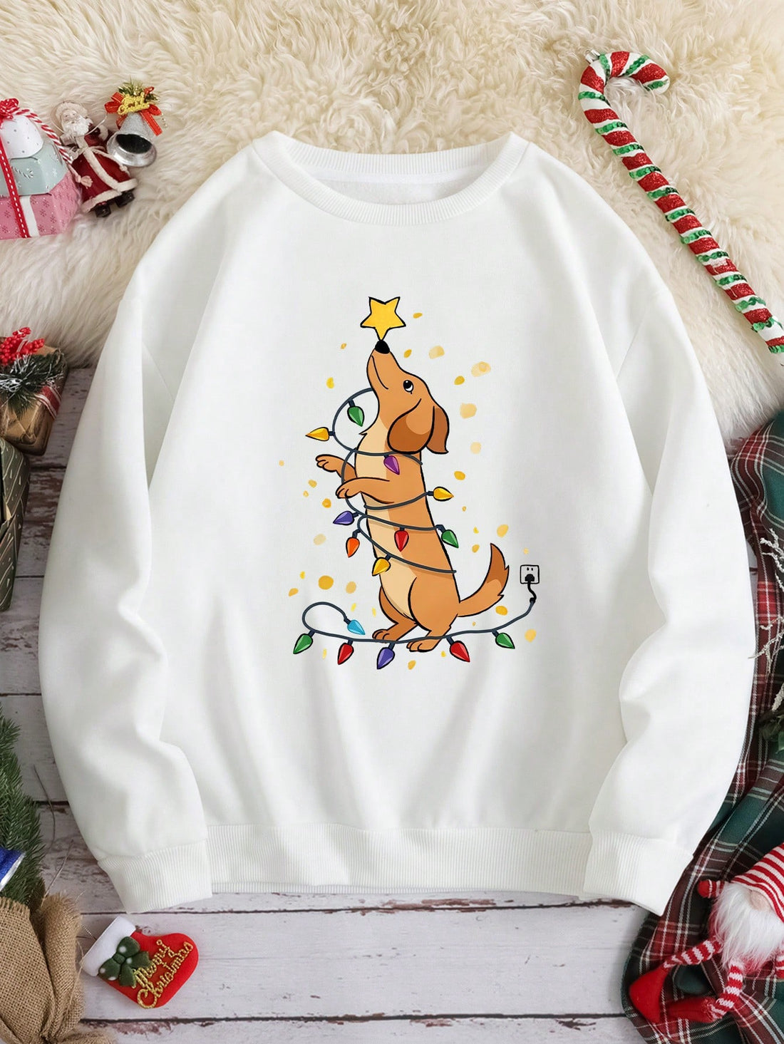 This Cute Puppy Graphic Christmas Sweatshirt for Women is the perfect addition to your festive wardrobe. With its adorable puppy graphic and cozy crew neck, this sweatshirt offers both style and comfort. Made with high-quality materials, it's sure to keep you warm and stylish throughout the holiday season. Order now and spread some holiday cheer!