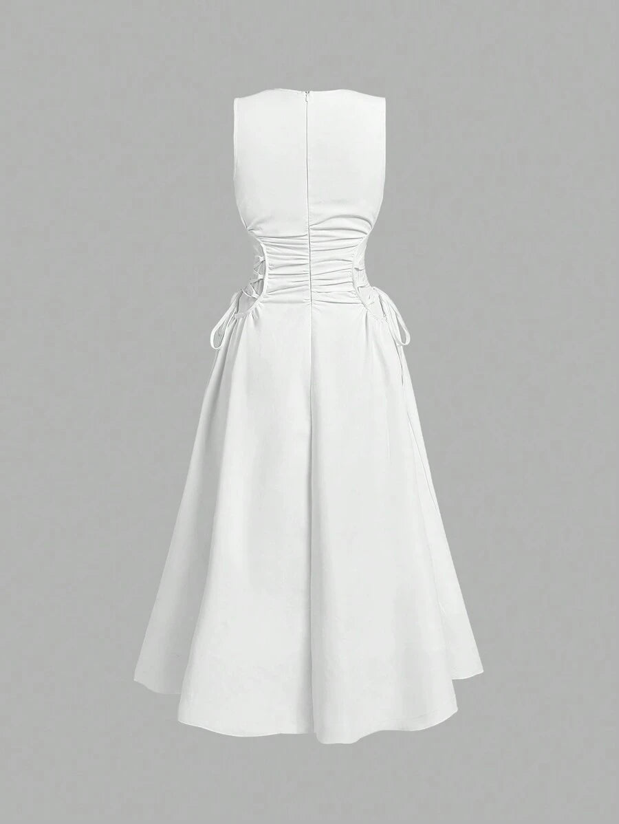 Back view of white midi dress with center seam and full skirt