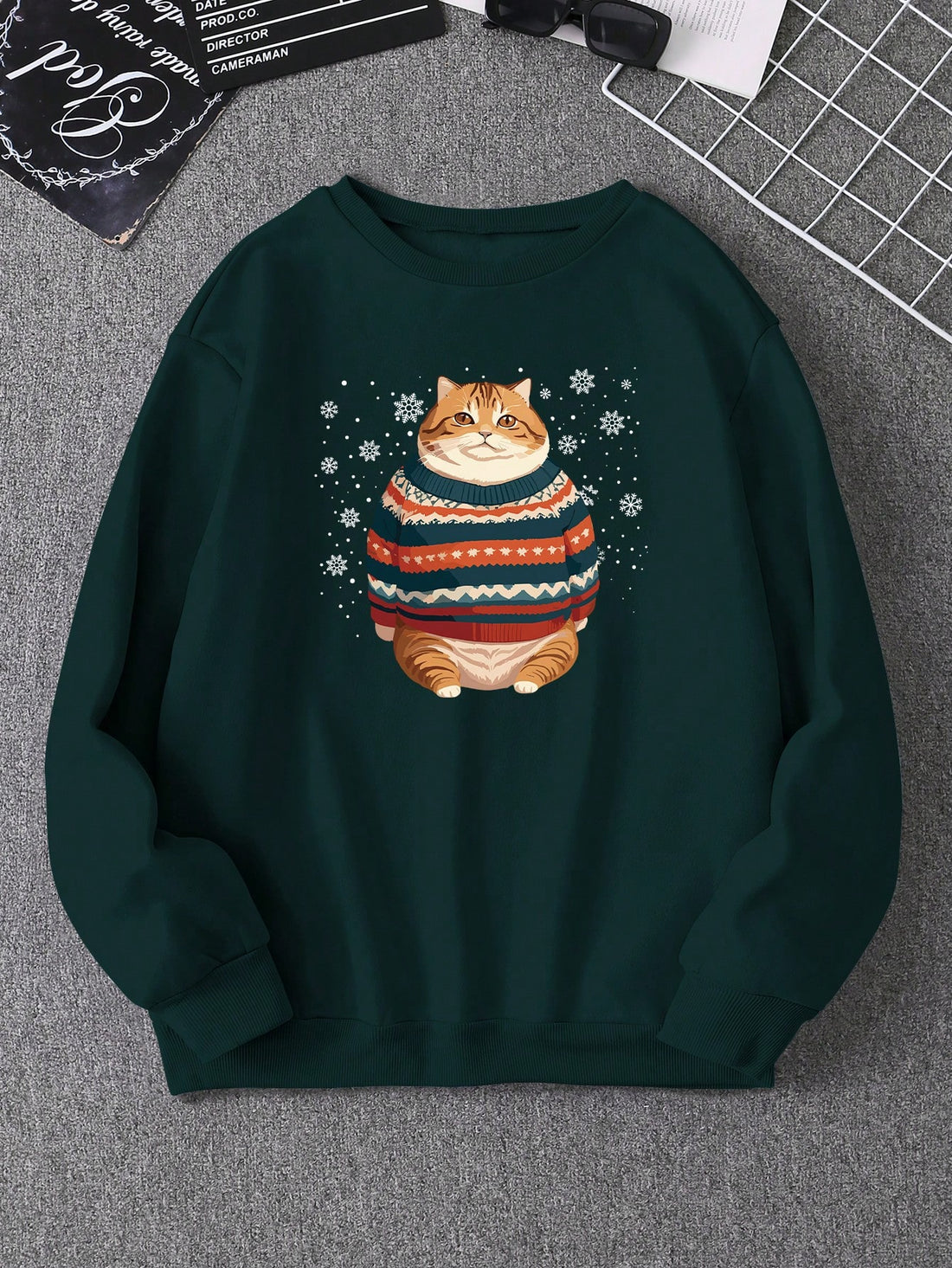 Get ready to snuggle up in style with our Cozy Cat Vibes oversized sweatshirt! Featuring a relaxed drop shoulder design, this sweatshirt is perfect for lounging or running errands. With its comfy fit and playful cat design, you'll be sure to stay warm and cozy while looking effortlessly cool.