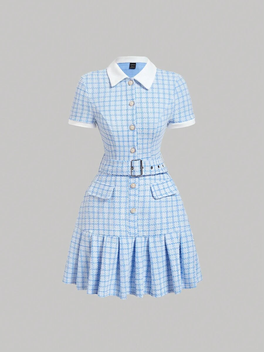 Front view of blue and white plaid pleated mini dress with collar and buckle belt
