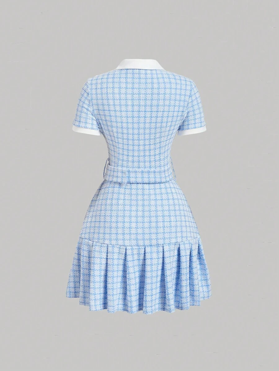 Front view of blue and white plaid pleated mini dress with collar and buckle belt