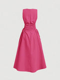 Back view of hot pink midi dress with zipper and full skirt