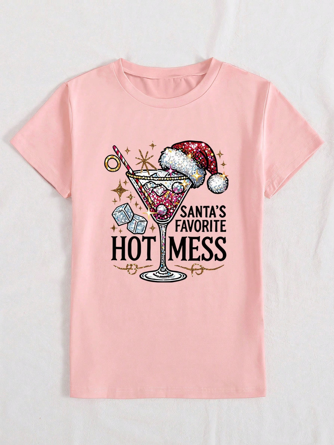 This festive Christmas wine glass graphic print tee for women is perfect for showing off your holiday spirit. Made with high-quality materials, it offers a comfortable fit and features a fun design that is sure to bring a smile to everyone's face. Get ready to spread some festive cheer with this festive tee!