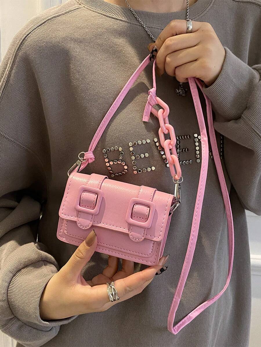 Front style view of mini crossbody bag in bright multicolor tones
