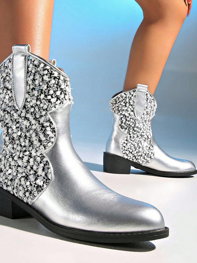 Retro Glam Silver Metallic Knee-High Boots with Spike Heel – Bold Fashion Statement for Women