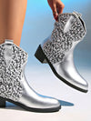 Retro Glam Silver Metallic Knee-High Boots with Spike Heel – Bold Fashion Statement for Women