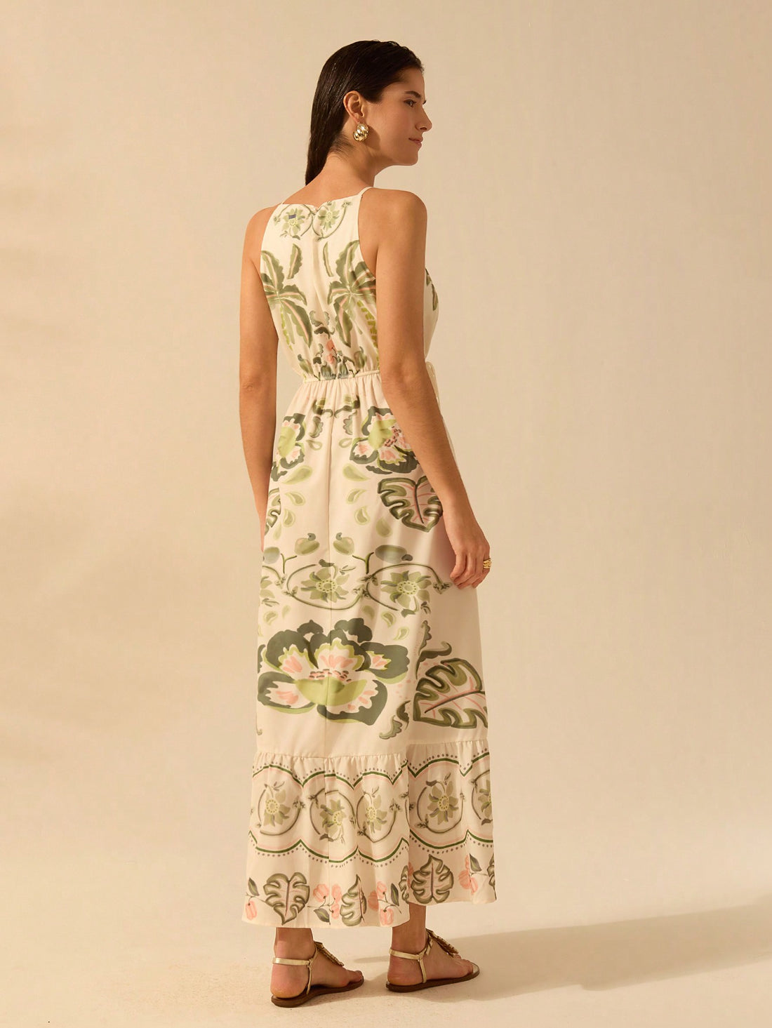 Get ready to turn heads with our Boho Chic Tropical Cutout Dress! Perfect for your next beach vacation, this dress features a playful hibiscus and coconut tree print that exudes tropical vibes. The cutout design adds a trendy twist, giving you a unique and stylish look. Embrace your inner bohemian with this must-have dress!