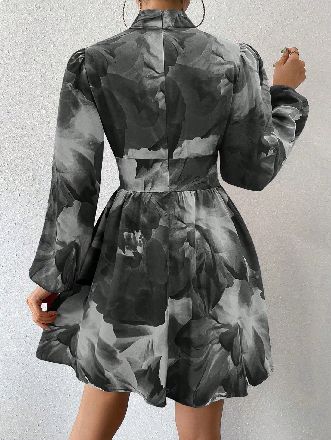 Get ready to turn heads with our Elegant All-Over Print Long Sleeve Dress! With a stylish keyhole neck and intricate hollow out detail, this dress is perfect for any occasion. The all-over print adds a pop of personality to this already stunning dress. You'll be the talk of the town every time you wear it!