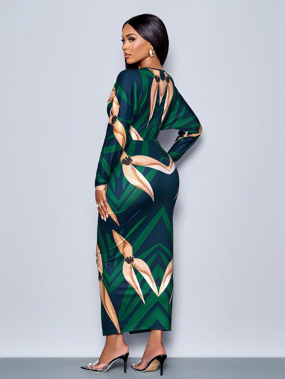 Step into the spotlight this holiday season with our Elegant Winter V-Neck Bodycon Dress. Featuring a sultry split thigh design, this dress is perfect for rocking the dance floor at any holiday party. Embrace your inner fashionista and turn heads in this must-have dress.