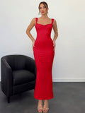 Bright red open back bow maxi dress detail