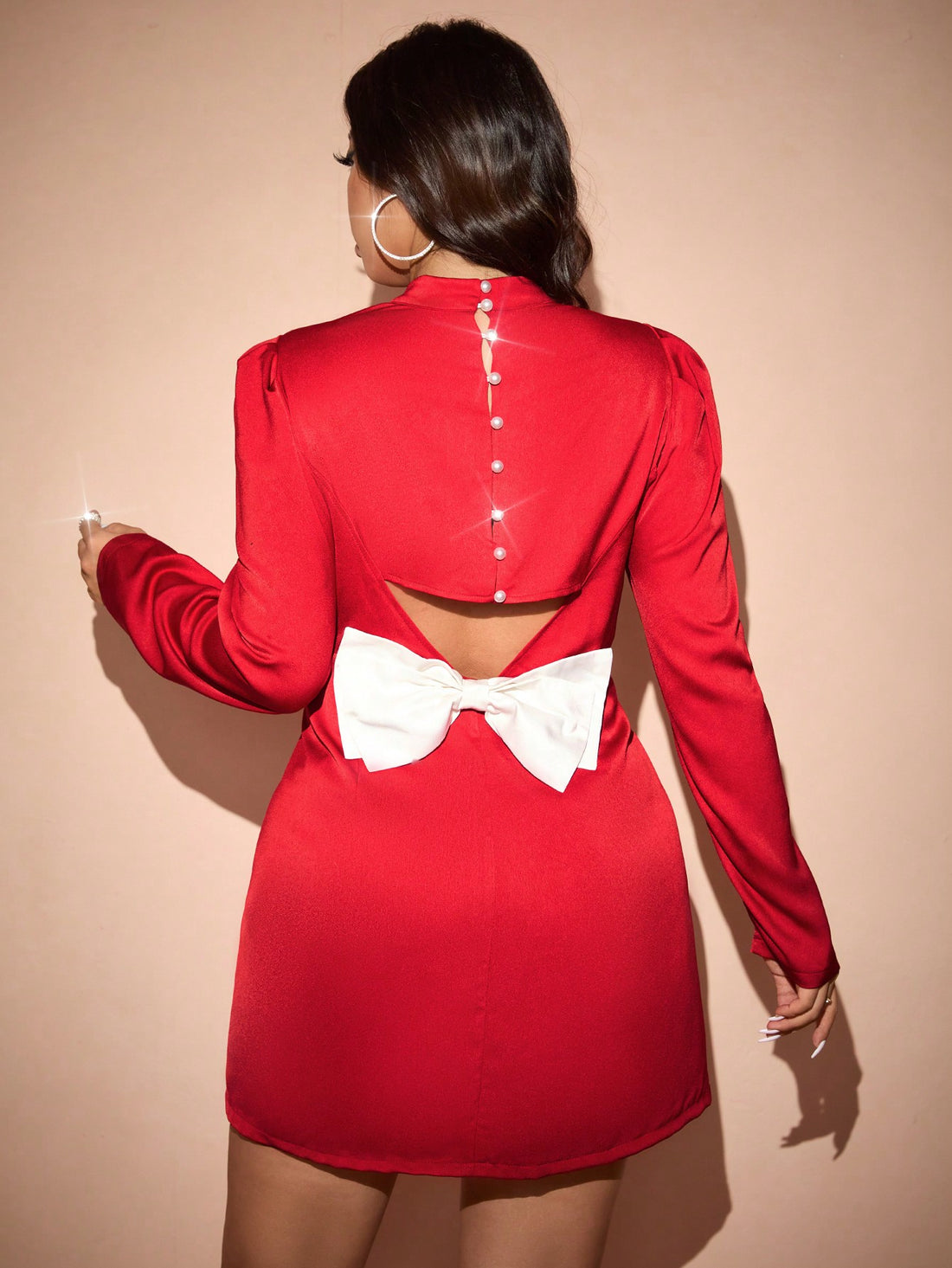 Be the belle of the Christmas party in our Festive Elegance mini dress! This plus size dress features a trendy colorblock design and a charming bow back for a touch of holiday flair. You'll feel confident and stylish while celebrating the season in this dress.