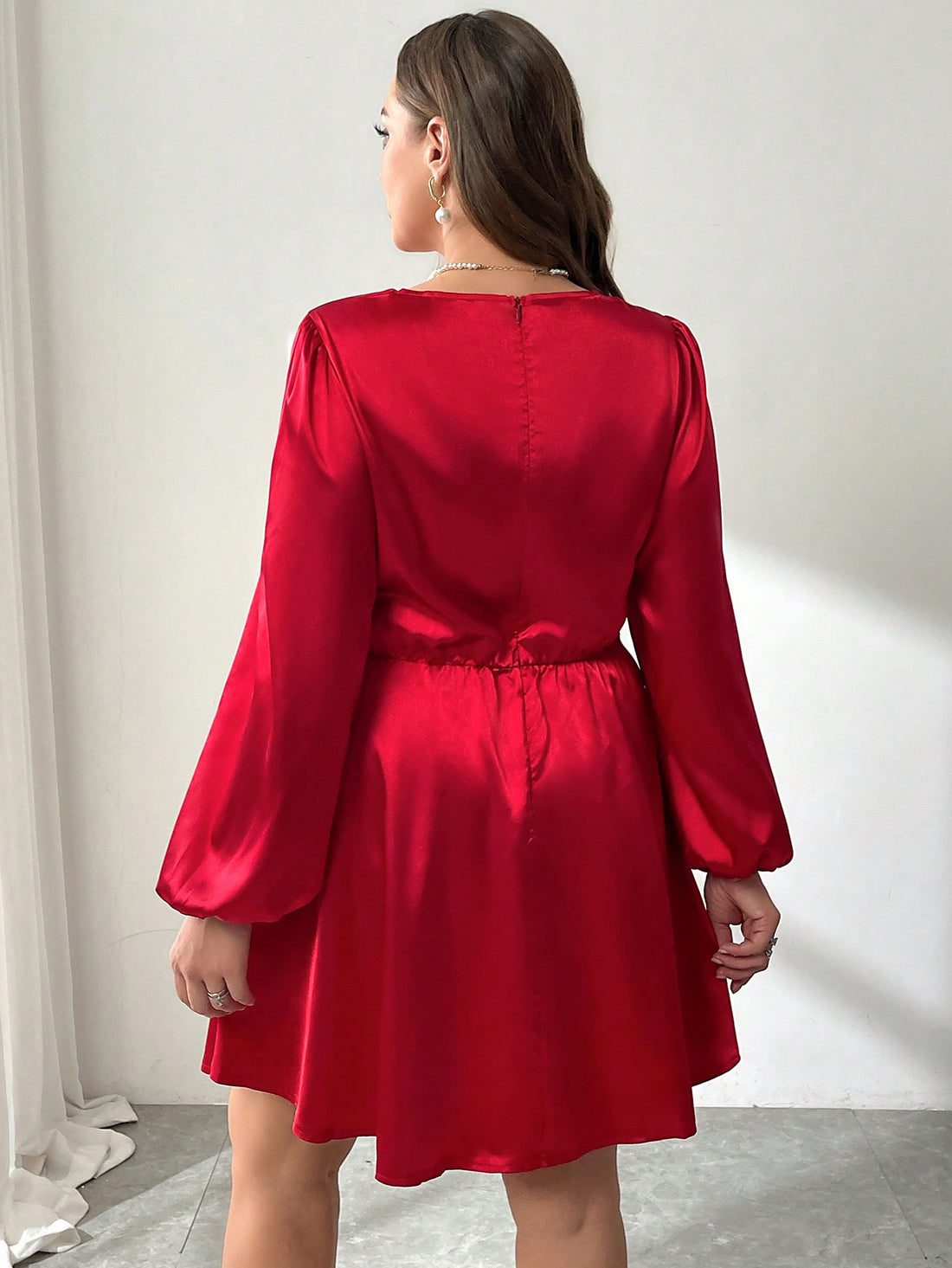 Turn heads on your next date or concert night with this playful plus size V-neck satin dress. The front twist adds a flirty touch, while the pleated hem creates fun movement as you walk. Crafted for comfort and style, it’s the perfect blend of elegant charm and easygoing flair for your on-the-go wardrobe.