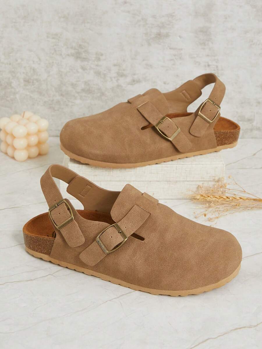 Suede look flat clogs with tan outsole and cork style heel
