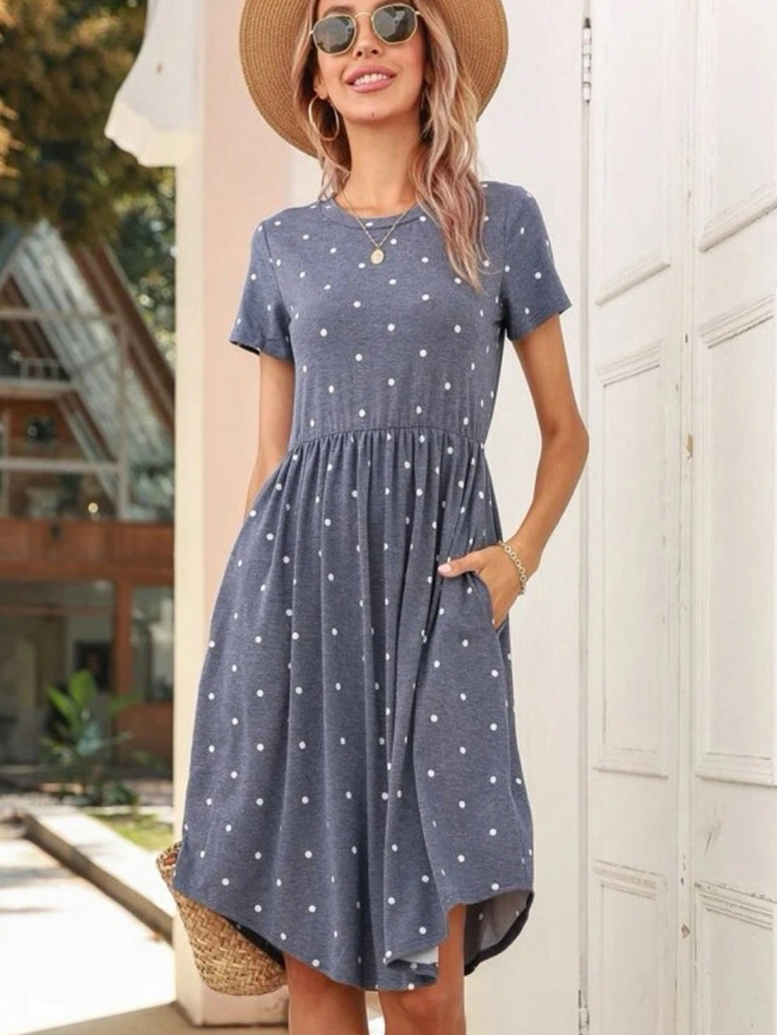 This playful tunic dress is the perfect addition to your summer wardrobe! With flirty blue polka dots, ruffles, and pockets, it's both stylish and functional. Stay cool and trendy in this must-have dress!