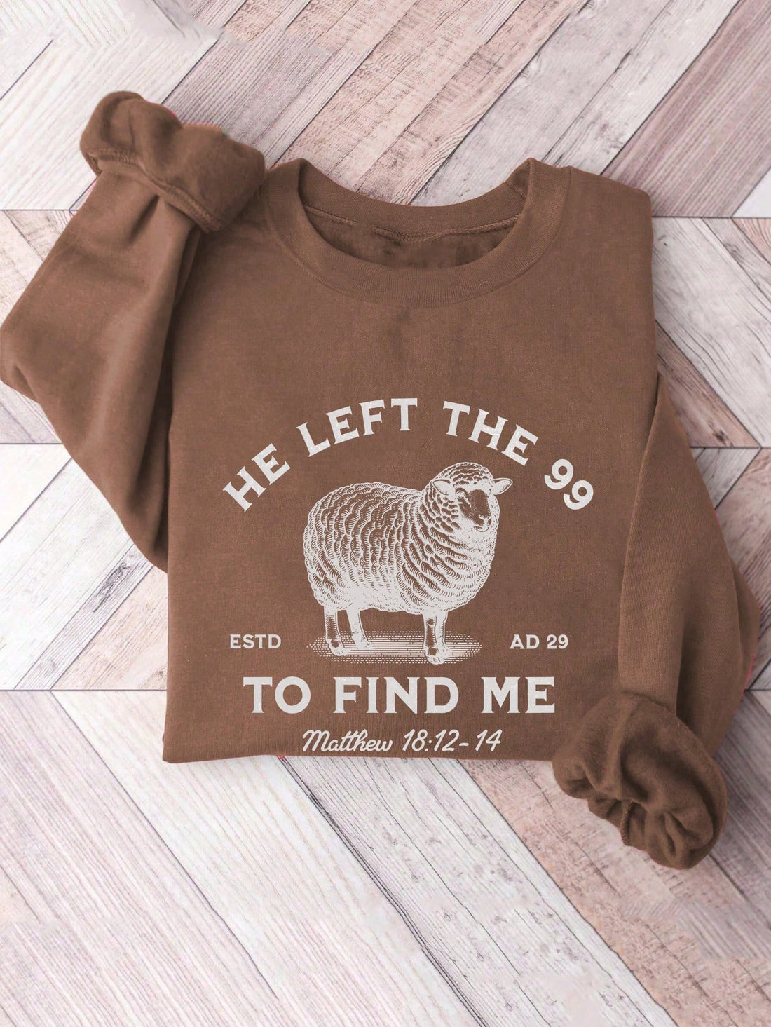 Stay warm and spread the message with our Sheep Saved 'He Left 99' Christian Crewneck Sweatshirt. Made with high quality material, this sweatshirt features a powerful reminder of the love and sacrifice of Jesus. Perfect for everyday wear or as a statement piece.