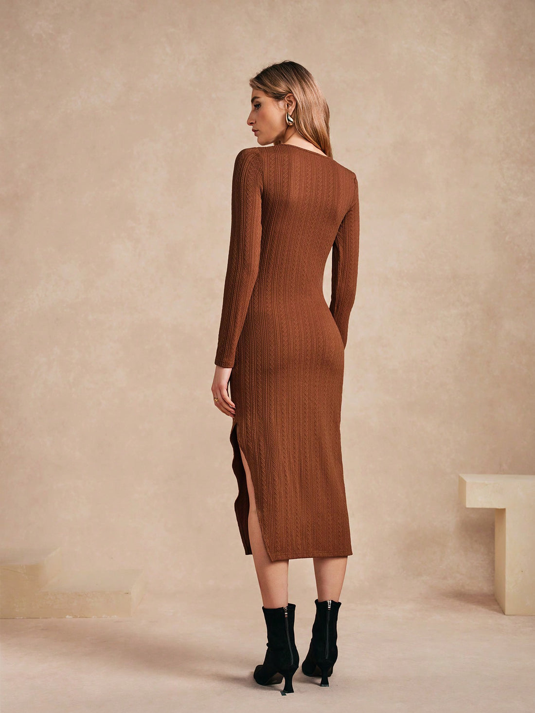 Get ready to turn heads in our Elegant Women's Fitted Knit Dress! This stylish and comfortable fashion choice will make you feel confident and chic. With its fitted design, it flatters your curves and its knit material ensures maximum comfort. A must-have for any fashion-forward woman!