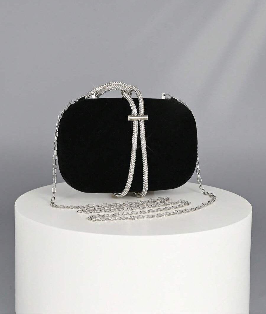 Turn heads at every event with this Elegant Satin Box Clutch. Its sleek black satin finish paired with sparkling crystal embellishments adds just the right touch of glam to your outfit. Compact yet chic, it’s perfect for carrying your essentials while dancing the night away or mingling at parties. A little sparkle goes a long way—make every moment shine with this playful, luxurious accessory.