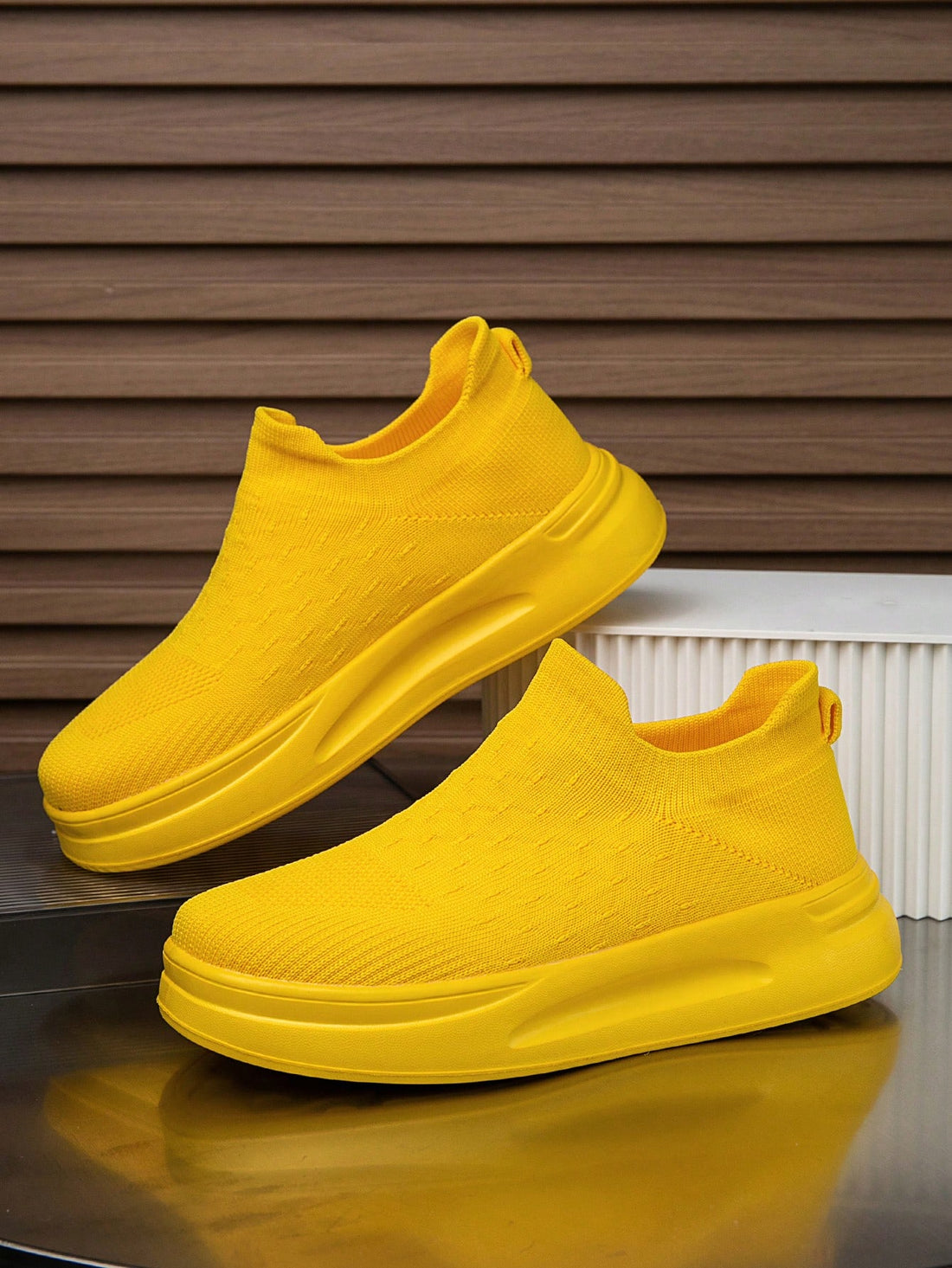 Trendy meets cozy with these knit slip-on casual shoes for women. The solid color design adds a touch of chicness while the thick sole provides unbeatable comfort. Perfect for everyday wear, these shoes will keep you looking stylish and feeling comfy (without breaking the bank)!