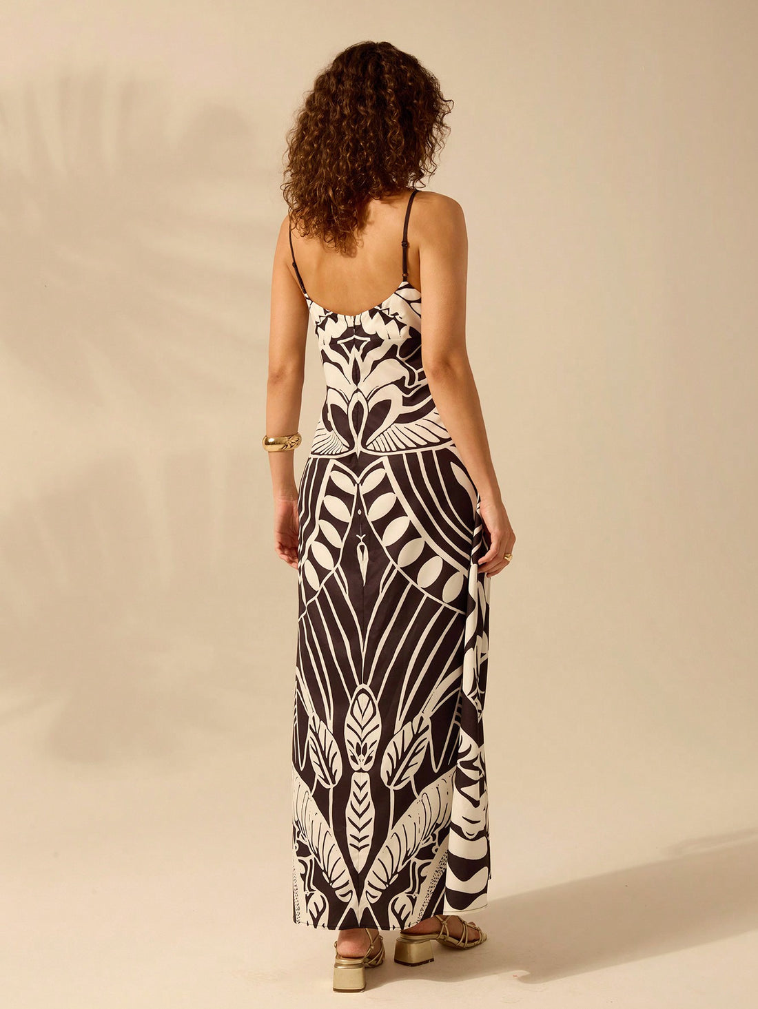 Get ready to turn heads this summer with our Boho Chic Tropical Print Dress! Perfect for any summer vacation, this dress features a vibrant tropical print that will make you stand out from the crowd. Its lightweight and flowy design will keep you cool and comfortable while looking effortlessly stylish. Don't miss out on this must-have piece!