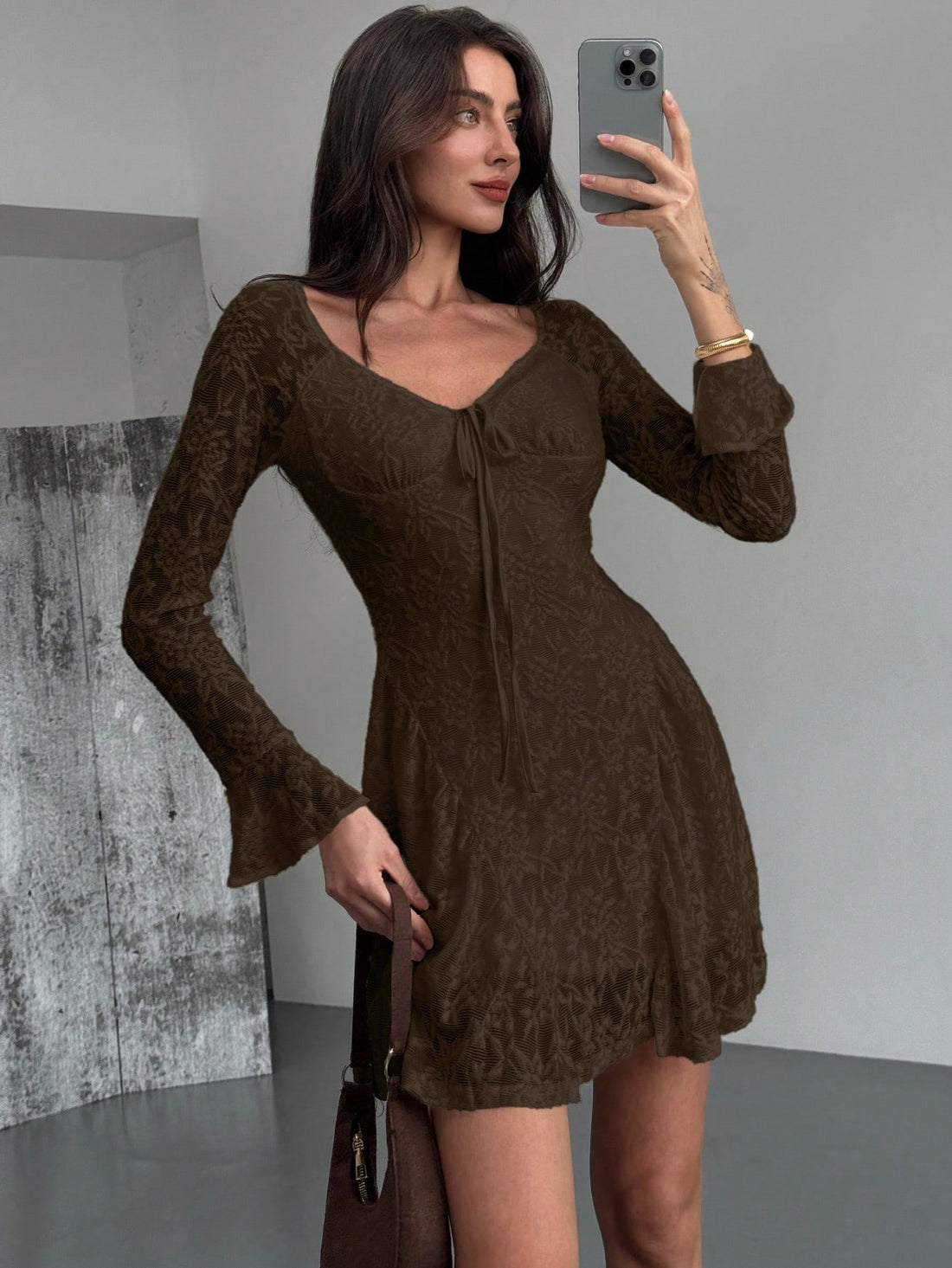 Elevate your style with our Chic Tie-Front Flared Sleeve Bodycon A-Line Dress! Made with textured fabric, this dress boasts a flattering A-line silhouette and trendy tie-front detail. The flared sleeves add a touch of femininity and movement. Perfect for any occasion, this dress will make you feel confident and stylish.