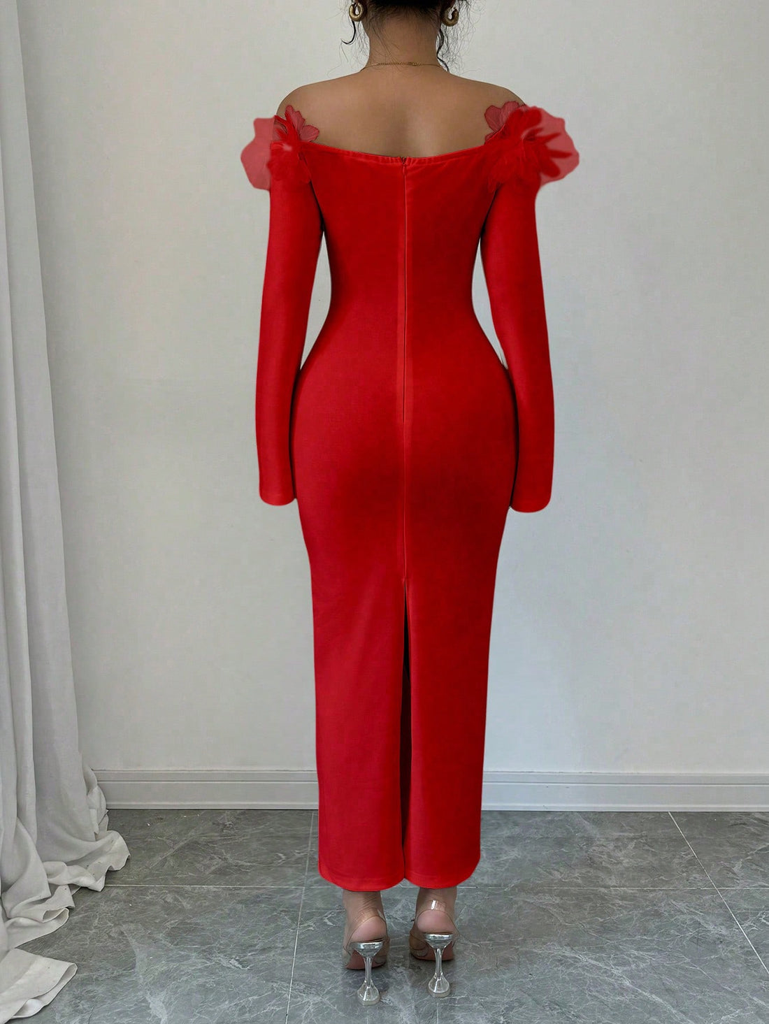 This stunning off-shoulder dress is the epitome of elegance. Crafted with long sleeves and 3D floral accents, it exudes femininity and sophistication. The off-shoulder design adds a touch of romance, while the intricate floral details add dimension and texture. Perfect for formal events or special occasions.