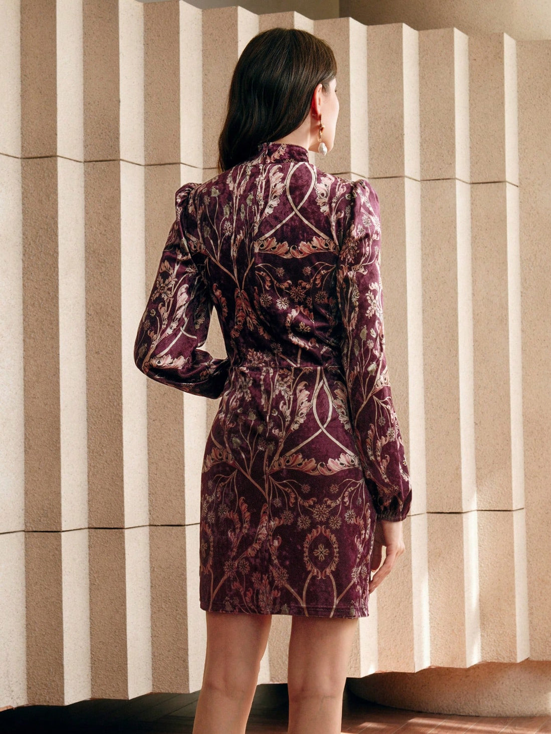 Add a touch of elegance and playfulness to your wardrobe with our Elegant Burgundy Velvet Mini Dress. Perfect for any casual occasion, this dress features long sleeves and a stunning burgundy color. Get ready to party in style with this must-have outfit!