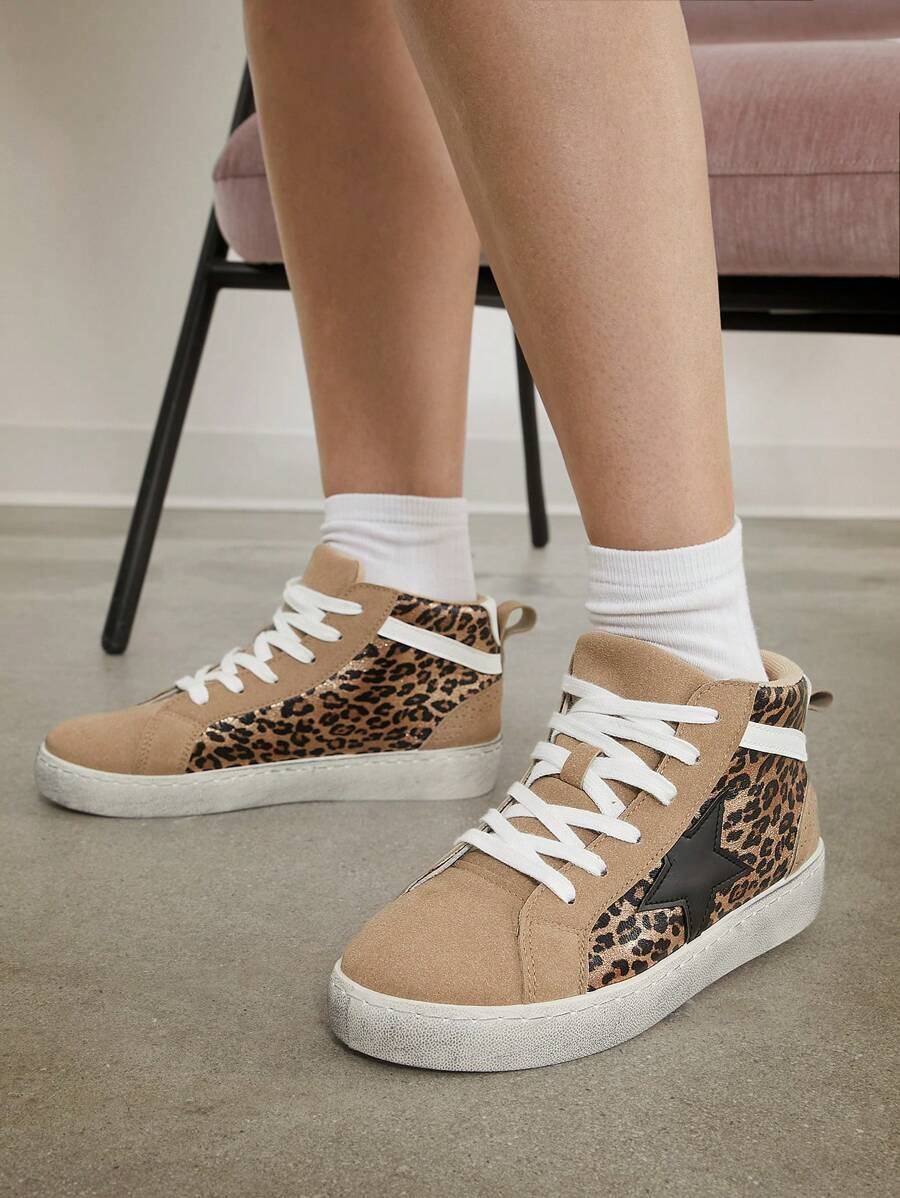 Get ready to step into the new year in style with our Stylish Leopard High-Top Sneakers for Women! These trendy sneakers are perfect for all your holiday and Easter celebrations, ensuring you look stylish and comfortable. Make a statement with this playful and fun addition to your shoe collection.