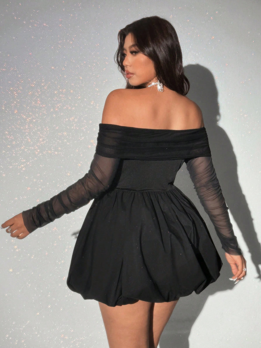 Turn heads effortlessly in this Elegant Plus-Size Off-Shoulder Mesh Bodycon Ruffle Dress. Designed to hug your curves with a flattering fit, its delicate mesh fabric and playful ruffles add a flirty touch. Perfect for nights out or special occasions, this dress combines comfort with style to make you feel confident and fabulous.