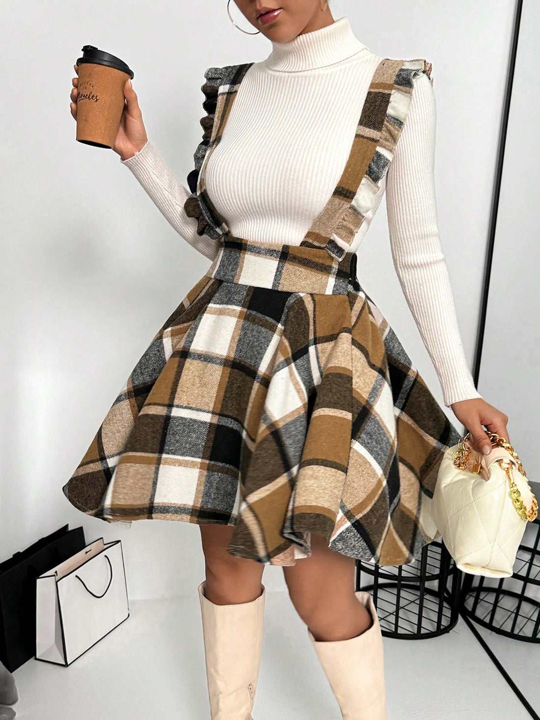 Get ready to slay in this Chic Autumn &amp; Winter Plaid Mini Dress! Perfect for cooler temperatures, this dress features elegant ruffle trims that add a touch of sophistication to the classic plaid design. You'll look stylish and stay warm all season long. (Stay boujee with this Chic Mini Dress!)