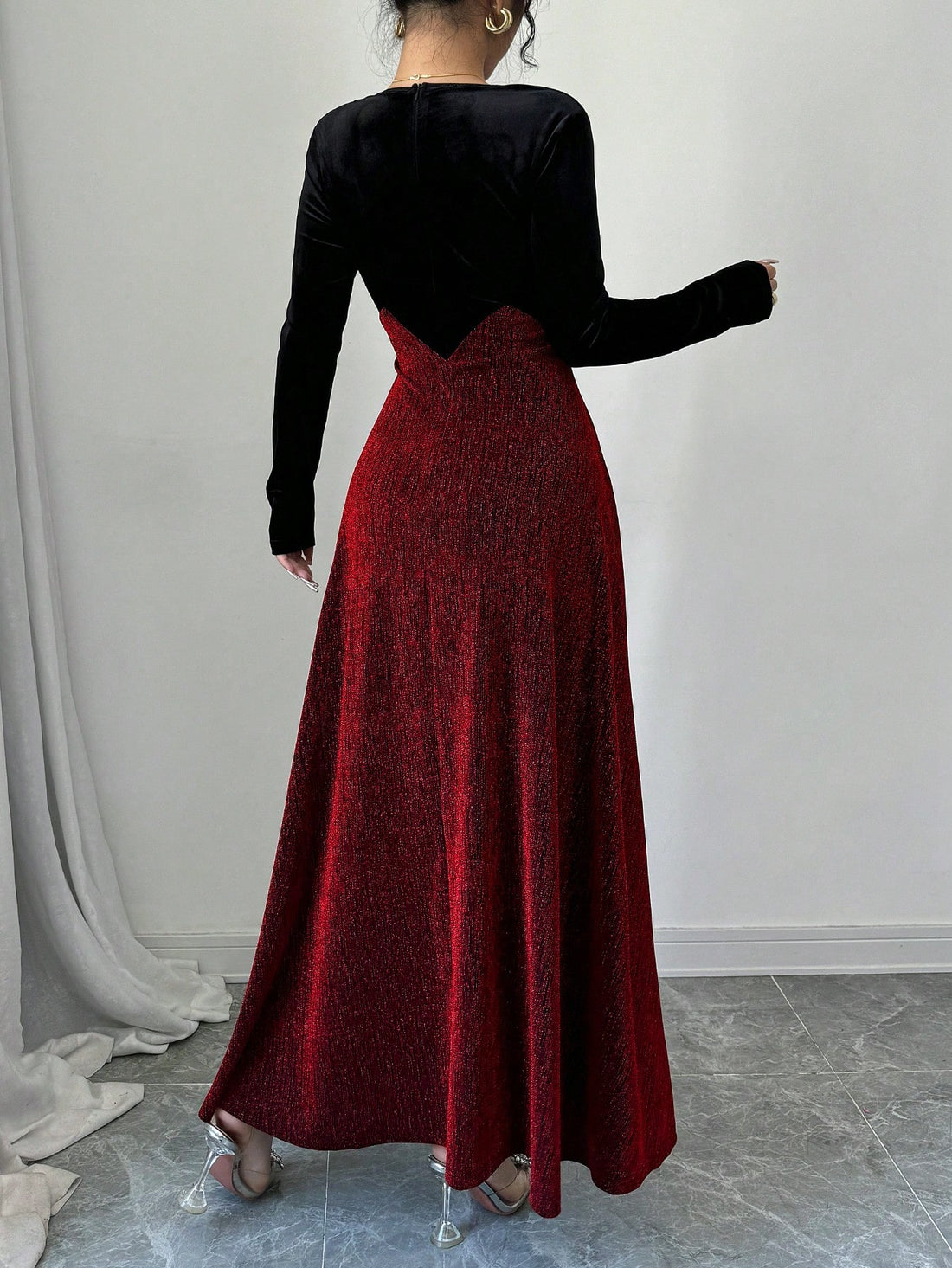 Get ready to turn heads with this Elegant Black Velvet A-Line Dress! Adorned with shimmering silver thread, this dress is perfect for any glamorous evening event. Its flattering A-line shape will have you feeling confident and stylish, making it a must-have in your wardrobe. Perfect for those who love to make a statement.