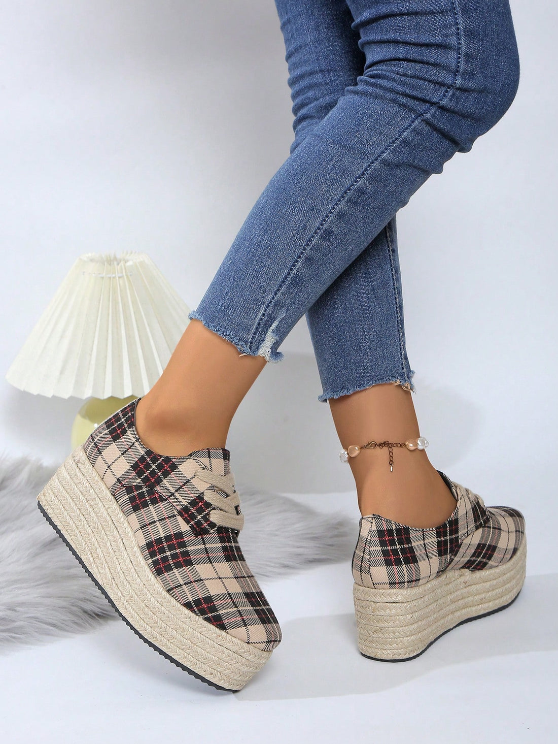 Level up your fashion game with our new Lace-Up Woven Platform Heels! Designed specifically for plus-size women, these heels will elevate your style (literally and figuratively). The woven detailing adds a unique touch, while the platform heel provides comfort and stability. Step up your shoe game today!