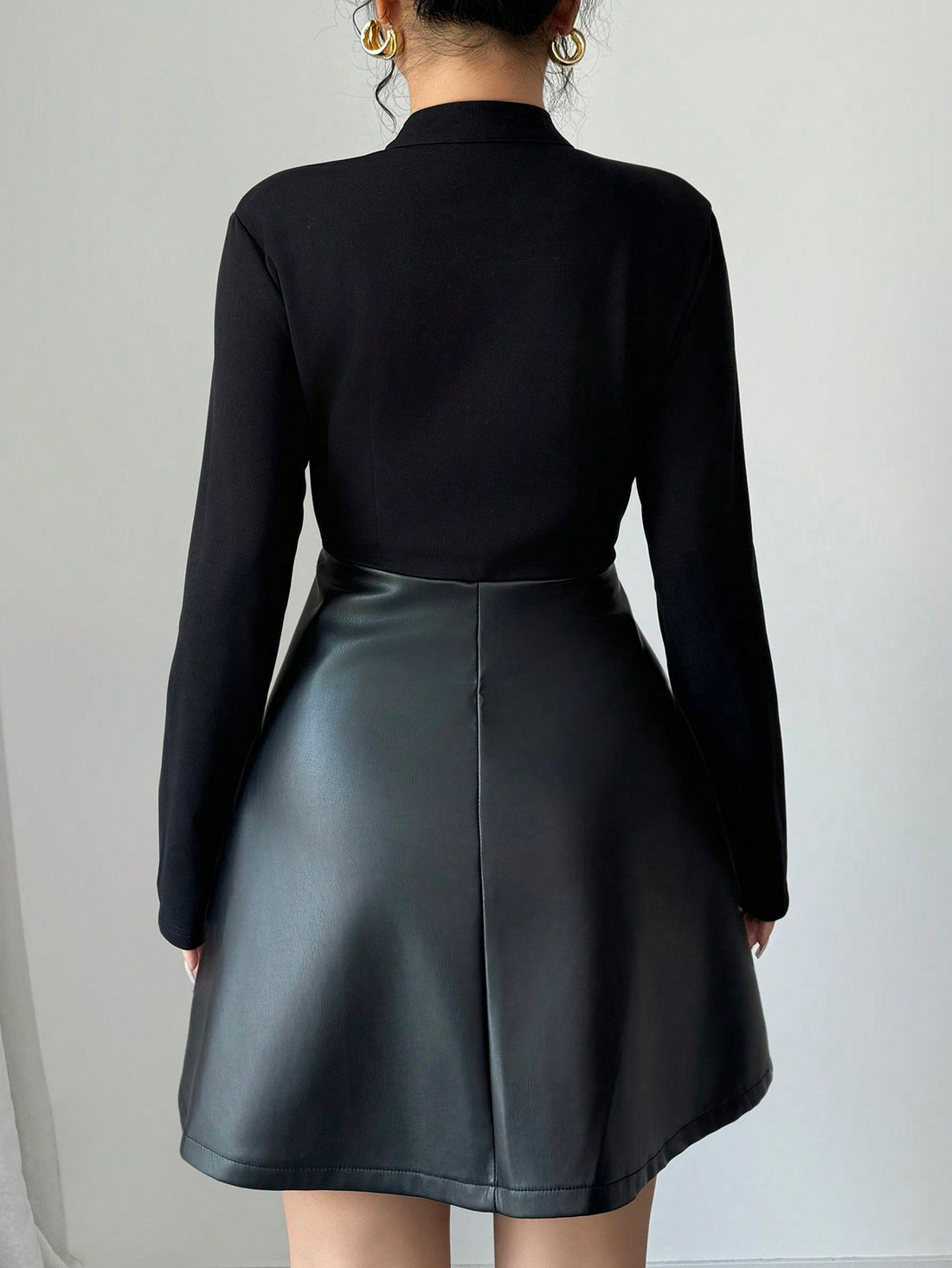 Elevate your wardrobe with this Chic & Stylish Mid-Length A-Line PU Patchwork Dress. Showcasing a flattering A-line silhouette and stylish patchwork design, this dress is perfect for both spring and autumn. Crafted with high-quality materials, it offers both comfort and style, making it a must-have addition to any fashion-forward closet.