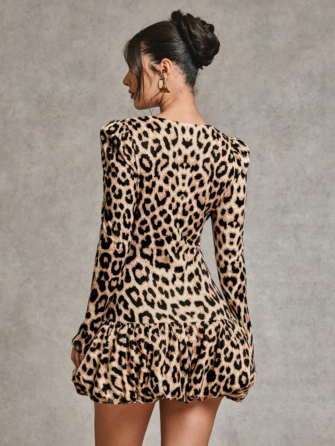 Make a statement at your next cocktail party or special occasion with our Elegant Leopard Print Bodycon Mini Dress! The ruffle hem adds a touch of femininity to this bold and stylish dress. Perfect for those who want to stand out in the crowd and feel confident in their fashion choices.