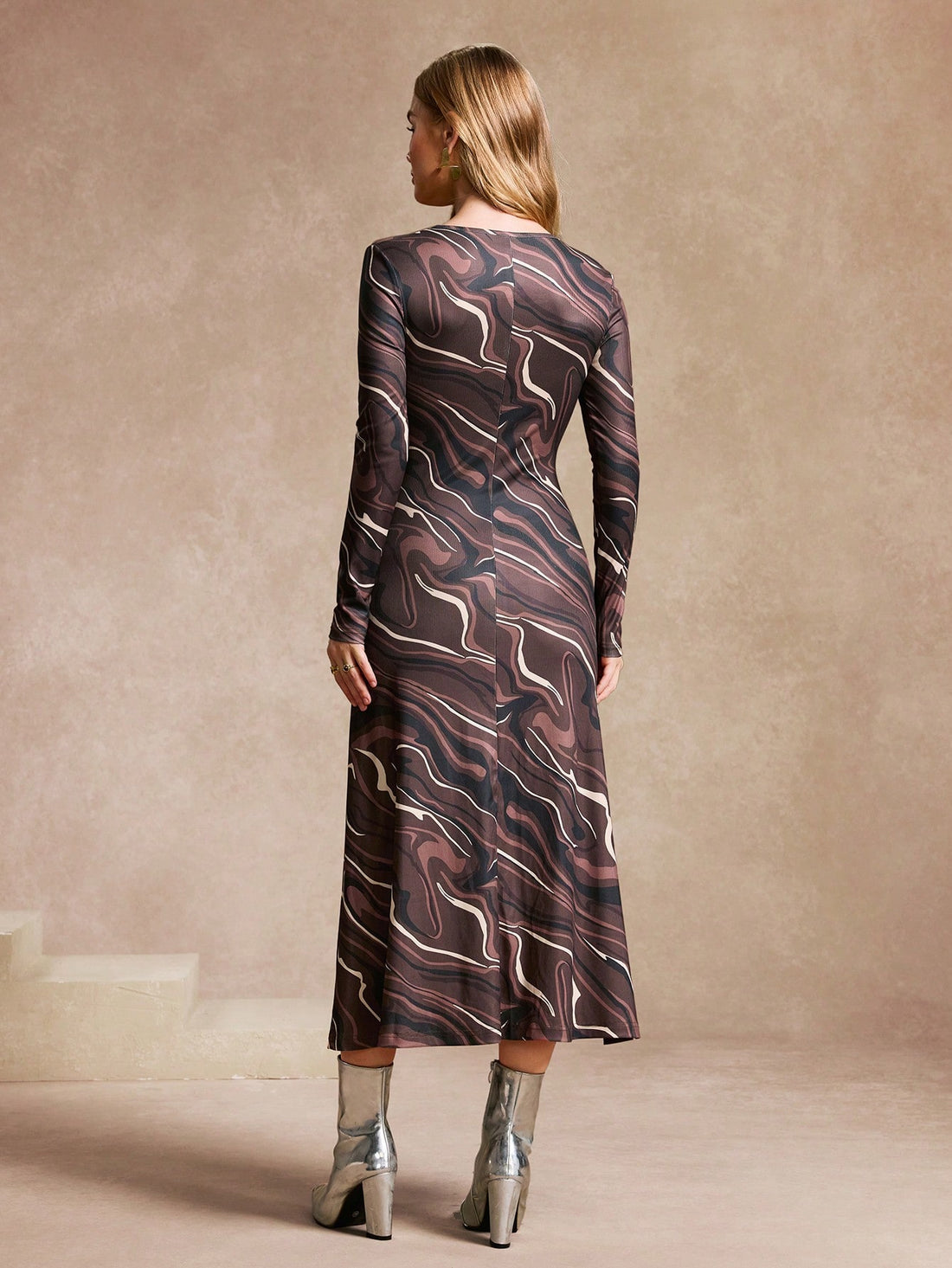Stay effortlessly elegant in our Women's Stylish Knitted Geo-Patterned Maxi Dress. With its unique geo-pattern and comfortable knit material, you'll radiate charm and charisma. Perfect for any occasion, this maxi dress is sure to turn heads and make a statement. (No need for effort, just elegance.)
