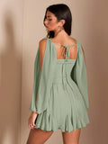 Back view sage green chiffon mini dress with smocked back tie-back neckline open slit sleeves and ruffle hem