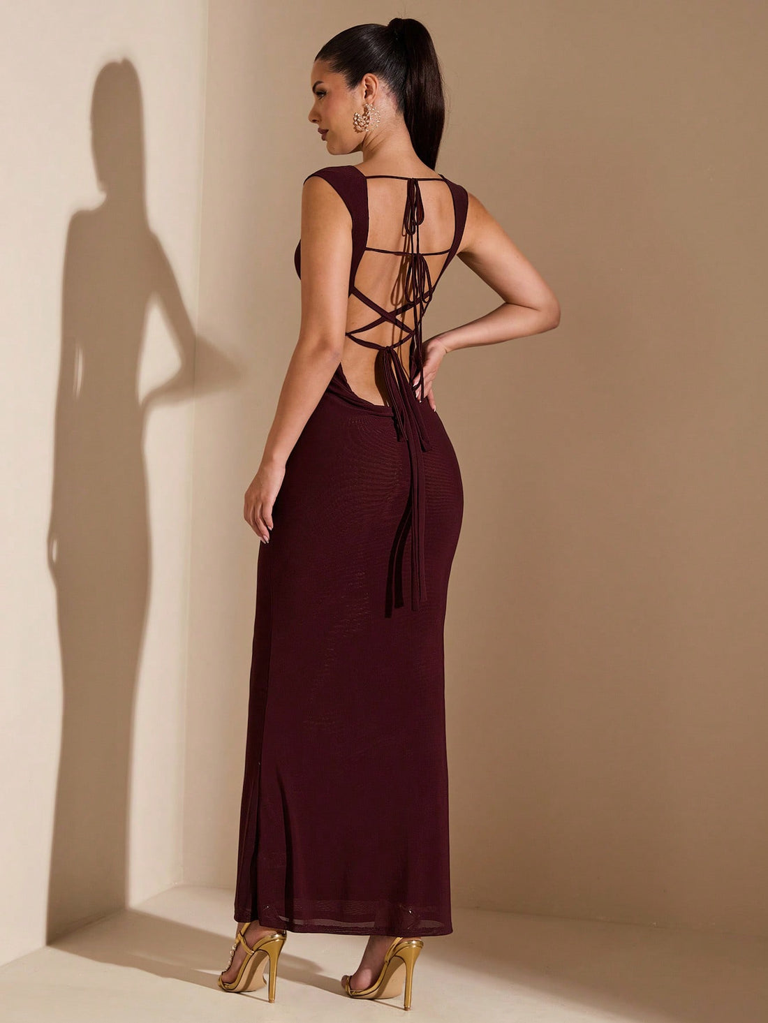 Get ready to turn heads with our Elegant Burgundy Backless Bodycon Dress! Perfect for dates and parties, this dress features a stunning ruffle hem and a playful backless design. Make a statement and feel confident in this stylish dress!