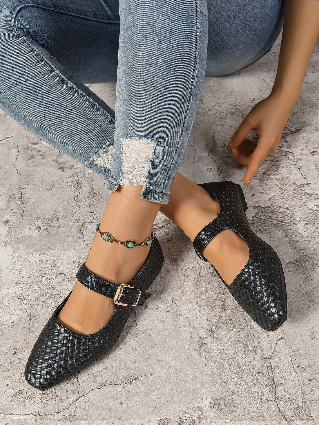 Step into style and comfort with these black woven ballet flats, featuring a chic metallic buckle that adds just the right sparkle. Perfect for everything from casual days out to special occasions, their breathable woven design keeps your feet happy while turning heads wherever you go. Playful yet polished, these flats are your new go-to for effortless flair!