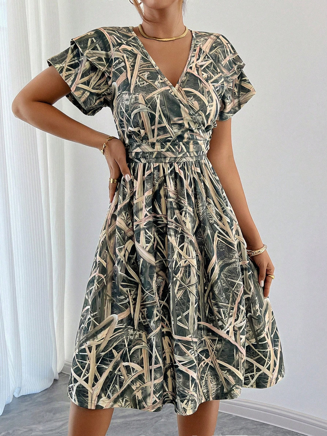 Indulge in the perfect combination of vintage and modern with our Floral Print Ruffle Hem Mid-Calf Dress. This dress exudes elegance and charm with its vintage-inspired floral print and playful ruffle hem. Perfect for any occasion, this dress will make you stand out with its unique style.