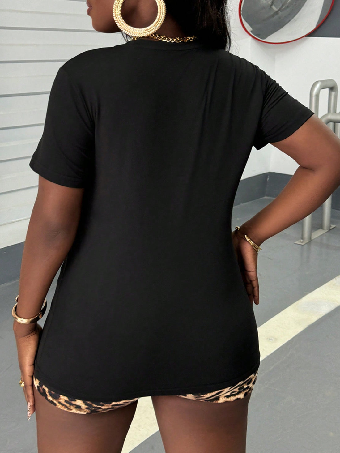 Spruce up your Valentine's Day wardrobe with our Playful Heart Print Leopard Plaid T-Shirt! Show off your wild side with this unique and playful design. Perfect for any casual or dressy occasion. (Rawr!)