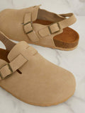 Casual comfort clogs worn with socks in model styling