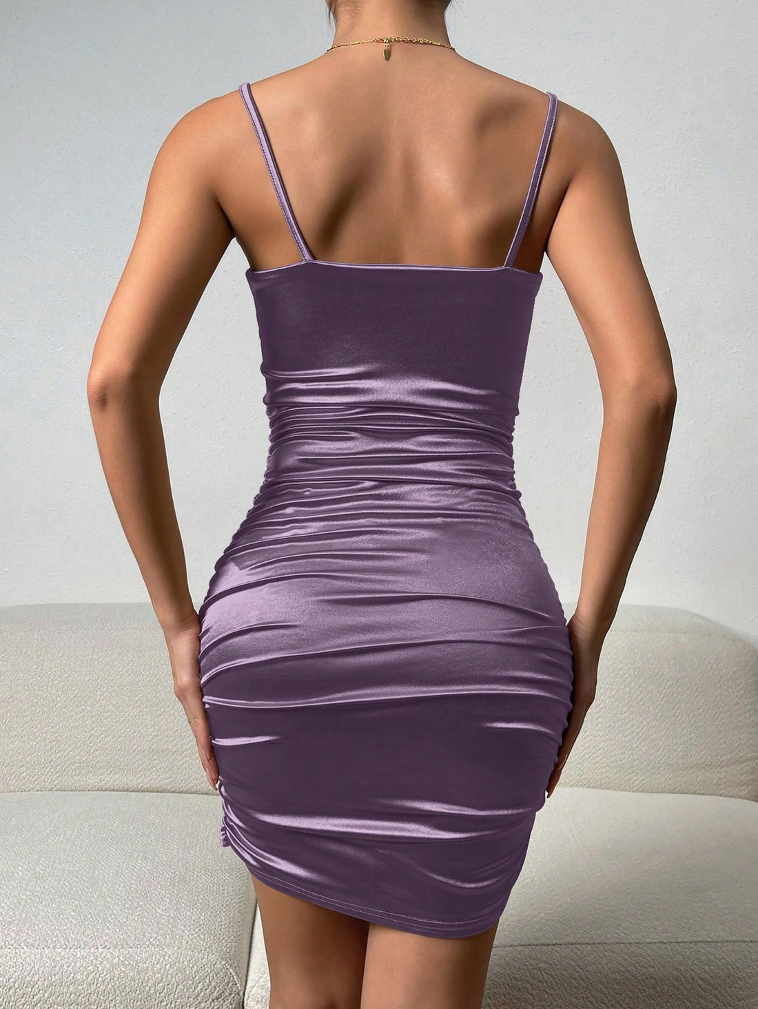 Elevate your summer style with our Elegant Ruched Bodycon Cami Dress. Designed to effortlessly hug your curves and enhance your figure, this dress will make you look and feel confident. The ruched detailing adds an elegant touch, perfect for any occasion. Enjoy effortless style all season long!