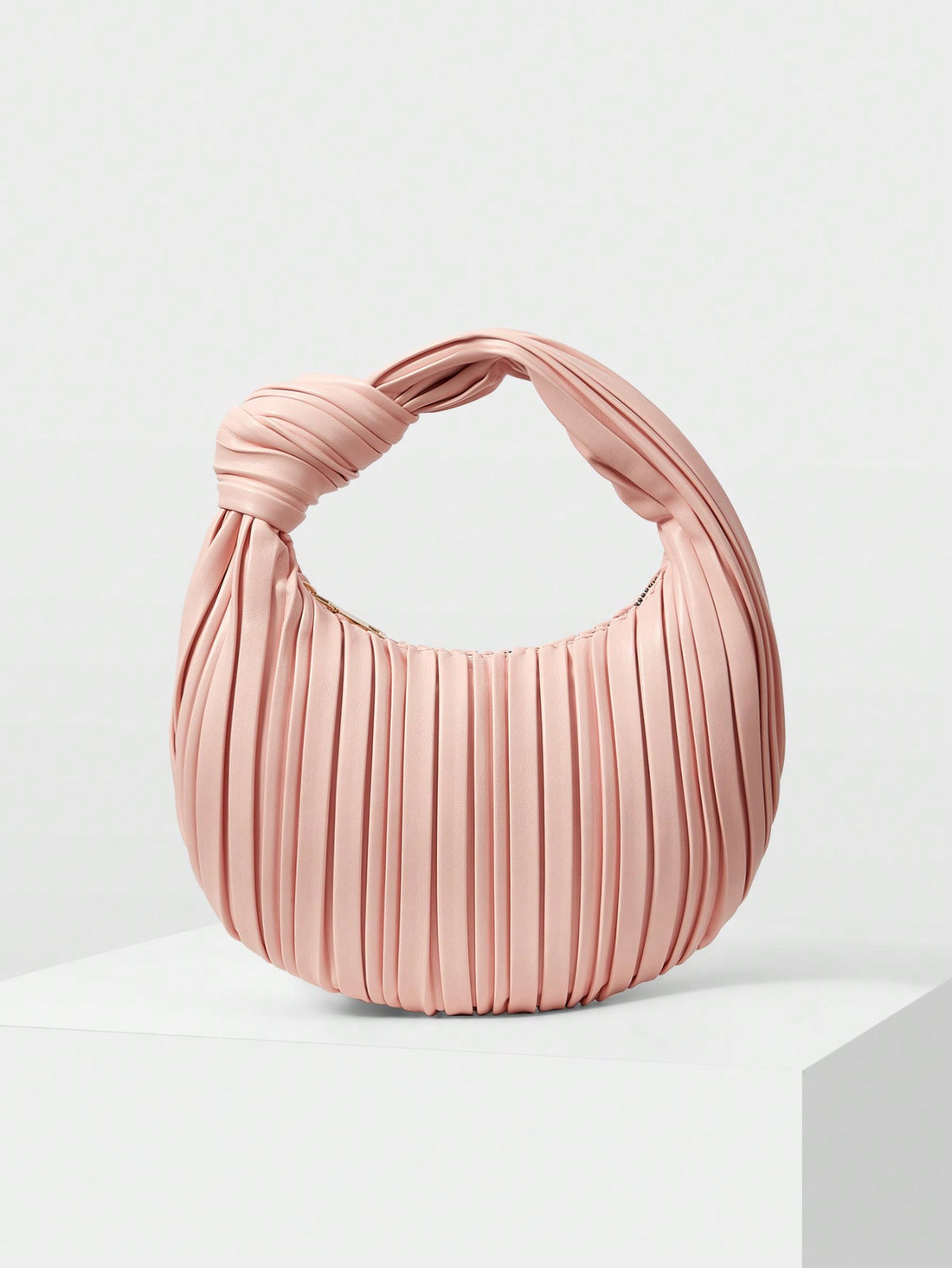 Elevate your daily commute with the Chic Solid Plisse Cloud Shoulder Handbag! Its soft, pleated design adds a whimsical touch to any outfit, while the roomy interior keeps your essentials organized and within reach. Lightweight and stylish, this bag turns everyday errands into a fashion statement you’ll love to carry.