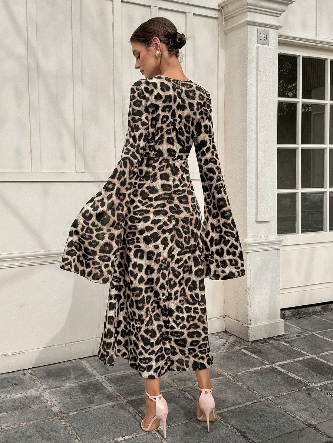 Unleash your wild side with our Chic Leopard Print Ruffle Sleeve Split Dress! This essential party piece features playful ruffled sleeves and a stylish split design, perfect for making a statement at any event. Embrace your inner fashionista and add some elegance to your wardrobe with this unique piece.